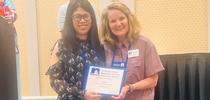 Yu Meng, receives the NEAFCS New Professional Award from Western Region President Dianne Christensen. for ANR Employee News Blog