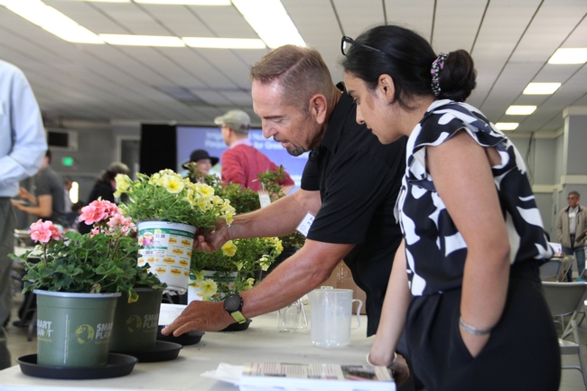 Don Merhaut (left) guides Haramrit Gill (right) during the technical live demonstrations.