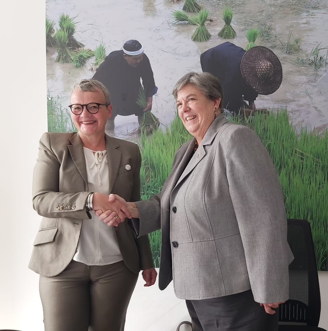 GFAiR's Hildegard Lingnau, left, and Humiston signed an MOU that will connect UC ANR with GFAiR's global network of research organizations.