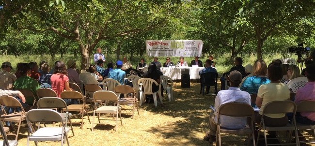 Jeff Mitchell, UCCE specialist, describes the California Farm Demonstration Network goals at the MOU signing ceremony in Winters.