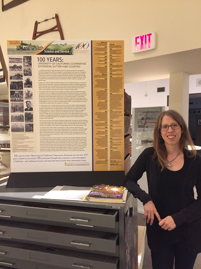 Jessica Hougen, Sutter County museum director, poses with drawers full of historical documents and information she summarized.