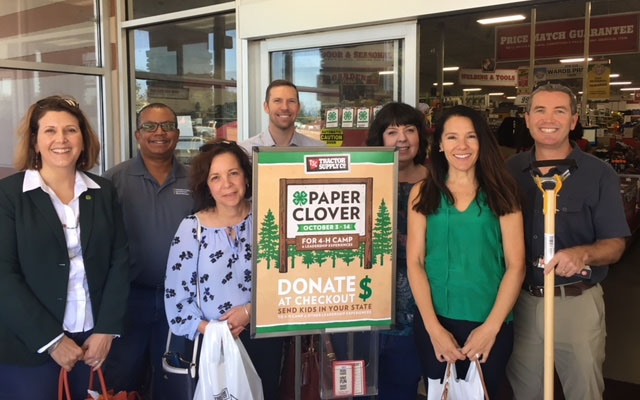 From left, Lorna Krkich, Greg Gibbs, Maria Fernandez, Kelly Scott, Emily Delk, Mary Ciricillo and Scott Brayton stopped by Tractor Supply in Dixon to buy 4-H Paper Clovers.