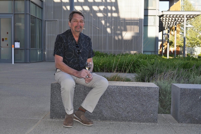 Jim Wolpert sits on bench dedicated to him by V&E faculty in April 2015.
