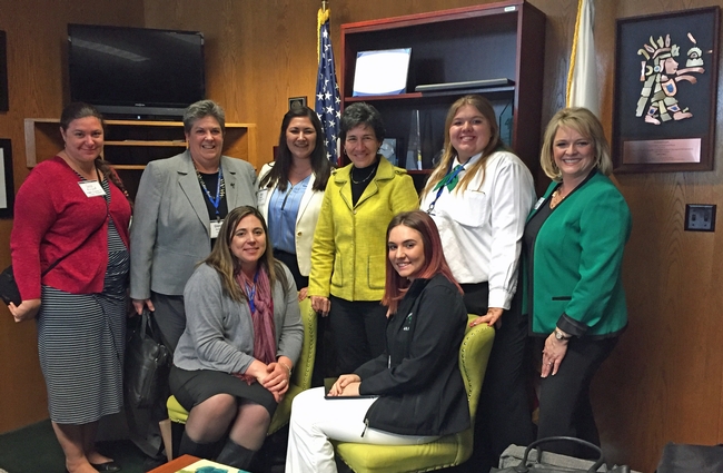 Assemblymember Susan Talamantes Eggman poses with UC ANR members in her office.