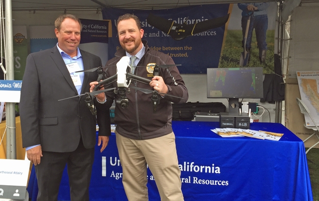 Sean Hogan, IGIS academic coordinator, talks drones with Assemblymember Devon Mathis.