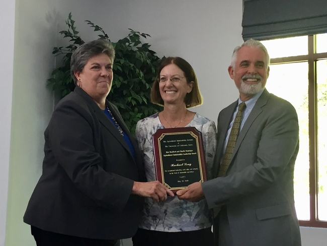 From left, VP Glenda Humiston, Rachael Long and Tom Tomich, director of the Agricultural Sustainability Institute, which hosted the award event.