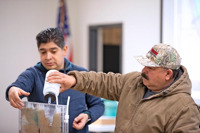 In 2019, offered more than 40,000 educational events across California on topics such as drought, climate change and invasive species. UCCE specialist Sam Sandoval gives soil and water management training for field workers in Spanish in 2019.
