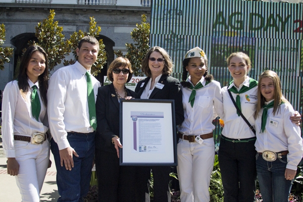 Karen Ross, third from left, and Barbara Allen-Diaz with 4-H members during Ag Day at the Capitol.