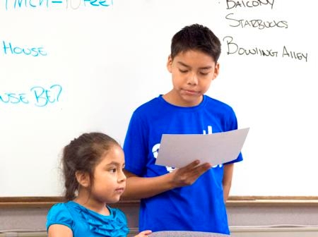 At a 4-H event, children discuss their dream community. Efforts to make 4-H more accessible have led to Latino children participation increasing by more than 40 percent.