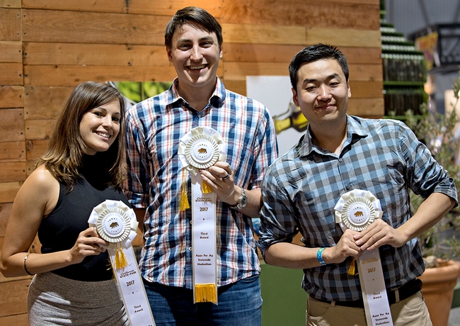 From left, Heather Lee, Will Mitchell and Zhenting Zhou finished third with their Farm Table app, which promotes agritourism.