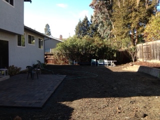 Backyard leveled out after dirt fill used to fill in pool