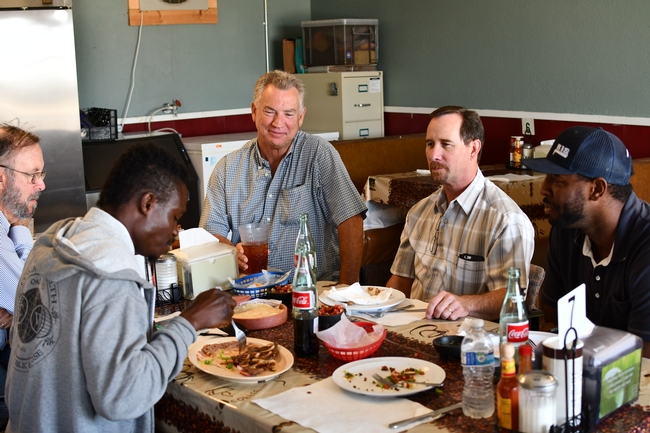 Local Fresno County CASI Workgroup members hosting Francis Akolbila in El Ranchero Café in Five Points, CA