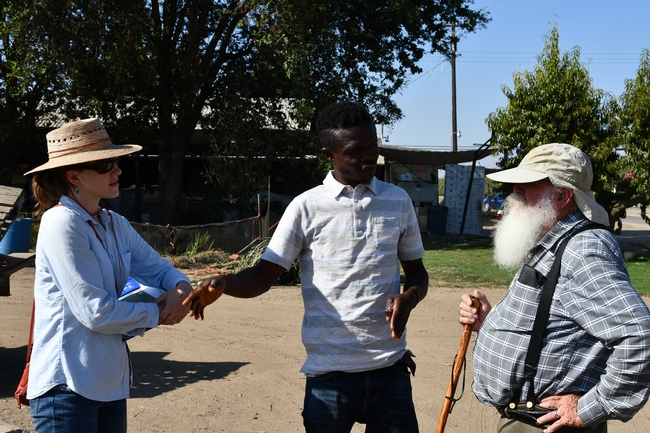 Priscilla Baker (NRCS Madera) (left), Francis Akolbila (center) and Tom Willey (left) at T & D Willey Farms in Madera, CA