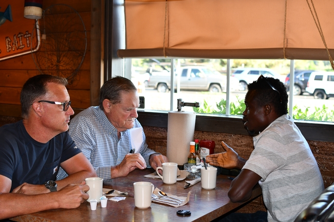 Adam Crowell, Michael Crowell and Francis Akolbila having breakfast in Huckleberry Restaurant in Turlock CA