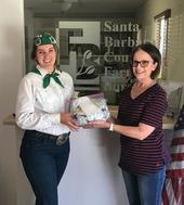 Olivia delivering 100 face masks to the Santa Barbara Farm Bureau.