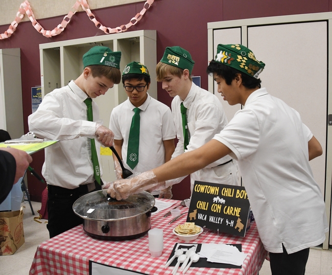 The Cowtown Chili Boys of the Vaca Valley 4-H Club--from left, Xander Lovell, Matthew Agbayani, Ian Weber and Francis Agbayani--test the temperature of  their chili at the Solano County 4-H Chili Cook-Off. They went on the win the competition. (Photo by Kathy Keatley Garvey)