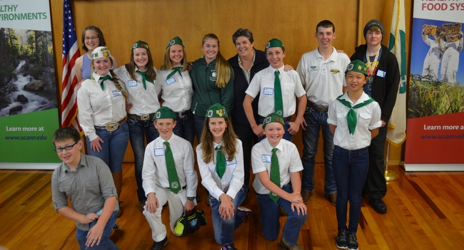 Glenda Humistorn, a former 4-H member herself, poses with 4-H members in Humboldt County.