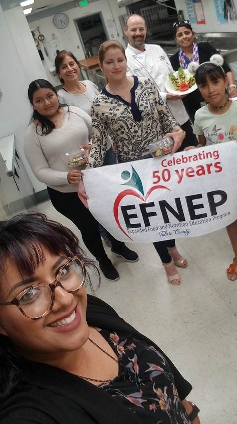 Mariana Lopez, EFNEP Nutrition Educator clicking a group selfie!