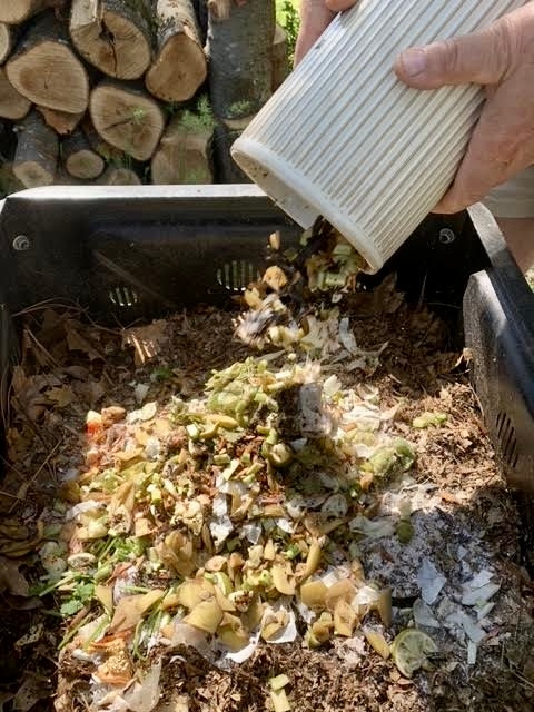 Add food to the top of bin.