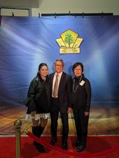 Loren Oki (center) with his daughter, Sebrienne (left), and wife, Cynthia (right), at the Green Industry Hall of Fame Award Ceremony in Fall 2023. Photo courtesy of Loren Oki.