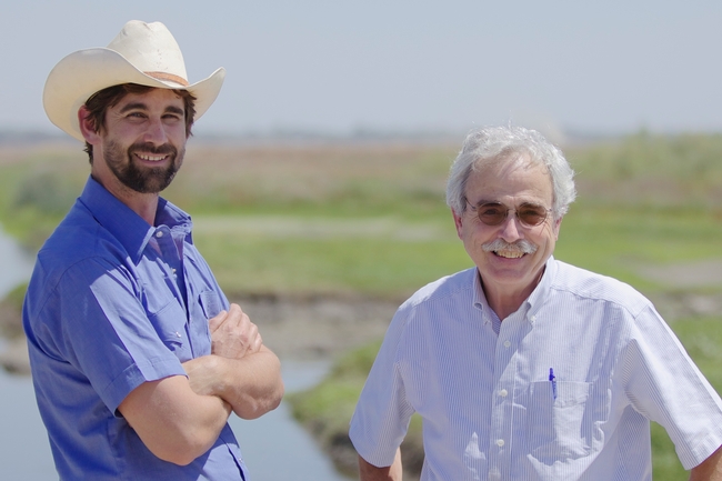 Jacob Katz (left), director of California Trout's salmon and steelhead initiatives, and Professor Peter Moyle (right) are pictured at the Yolo Bypass, where their research is evaluating the importance of the area for rearing juvenile salmon.