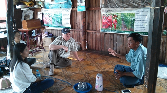 Interviewing a tomato farmer on Inle Lake.