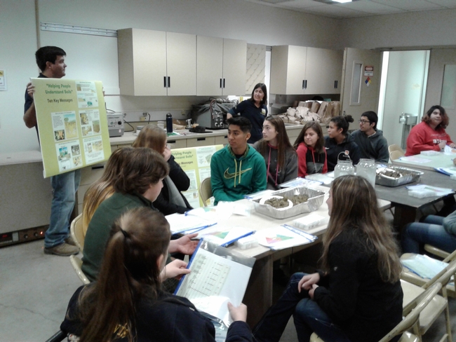 Students learn that healthy soil produces healthy crops.