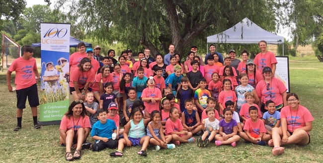 Campers pose for a photo with UC scientists during River Camp Firebaugh.