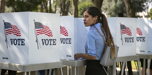 Destiny Martinez, 18, votes for the first time at the Power California early voting event and festival for students of the Los Angeles Unified School District on Oct. 24, 2018 in Norwalk. She said she liked the enthusiasm surrounding the day. Mindy Schauer / Orange County Register via Getty Images