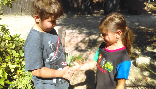 Children learning in the garden.