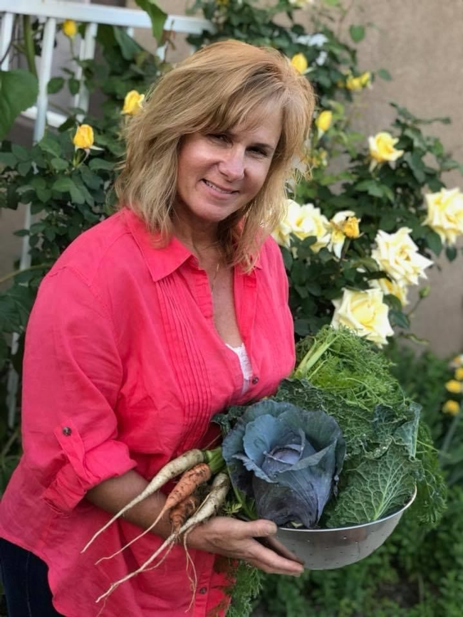 Master Gardener Debi Adams, with her harvest
