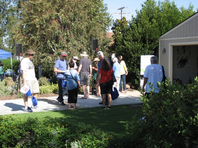 UCCE Master Gardener docents discuss low water use plants with interested visitors.