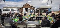 March 2023. Climate discussion group with farmers at Cardoza & Cardoza in Fresno, CA. Lilian Thaoxaochay translating for Hmong farmers. PC: Amber Butland. for Supporting Small Farms Blog