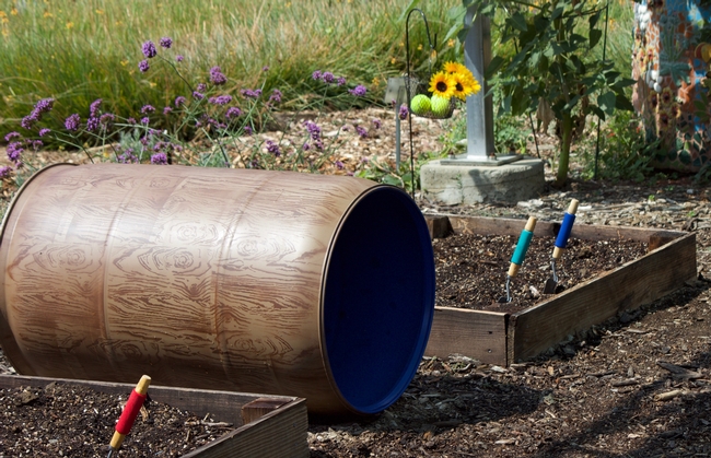Kid-sized raised beds with the solitary bee nest and 