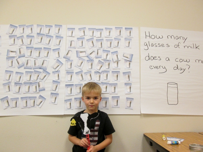201503 Dairy Day Kevin counting milk