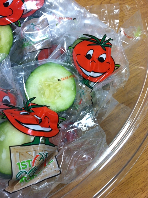 Students get sliced veggies as a snack