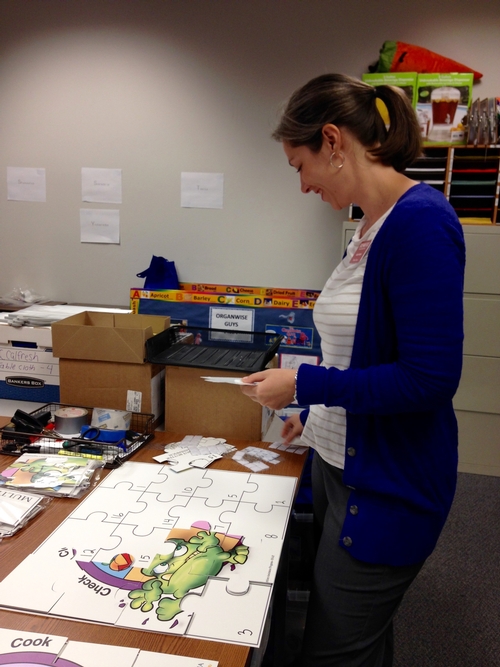 Here I am helping to put together new teaching tools that the educators use.
