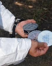 If the pesticide label requires an N95, you can use a half-mask with N95 particulate filters.