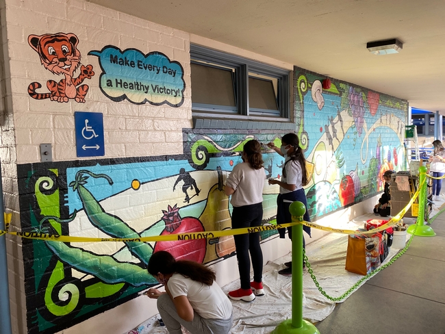 Students paint a mural
