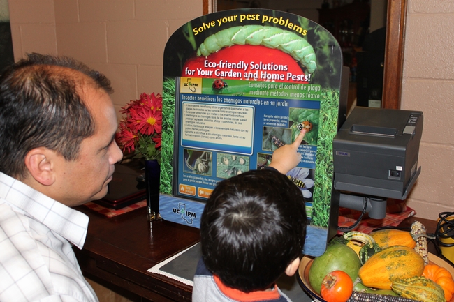 Touch-screen IPM kiosk used in outreach to Spanish-speaking audiences. Photo by K. Windbiel-Rojas.