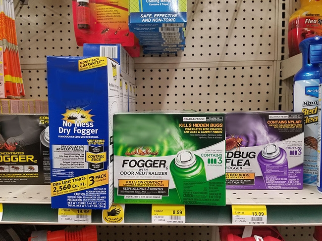Boxes of total release foggers on a store shelf.
