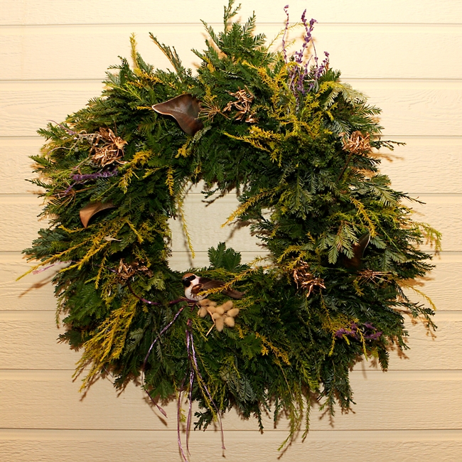 A wreath with breath of heaven, redwood and sage.