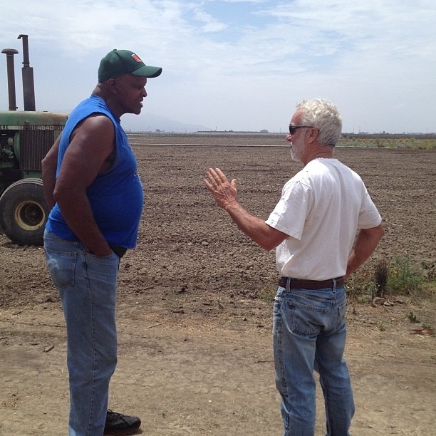 Will Allen con el granjero Phil McGrath.