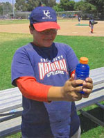 A boy with a sports drink.