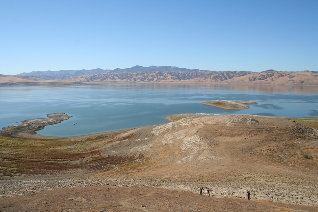 Anglers hike down to the water's edge at the San Luis Reservoir. The reservoir is at 30 percent of capacity.