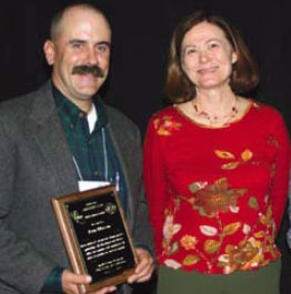 Dan Macon, with Shermain Hardesty of the Small Farm Program, receives the Pedro Ilic Award.
