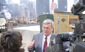 Cahill speaks to the media at Ground Zero.