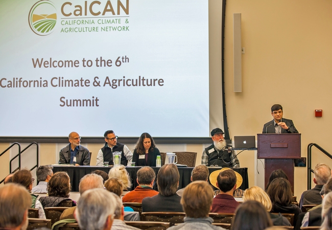 UCCE specialist Tapan Pathak addresses the audience at the CalCAN Summit.