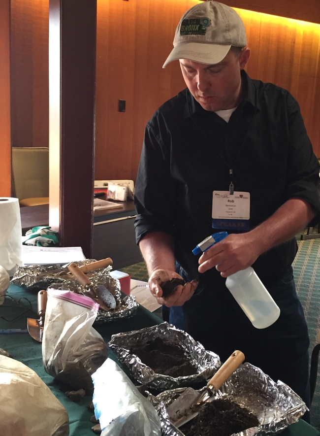 Rob Bennaton showed participants how to evaluate soil structure and advised them to test soil for contaminants before planting food crops.