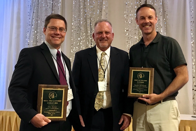 From left, Alec Gerry, president of the Pacific Branch of the Entomological Society of America Brad Higbee and David Haviland.